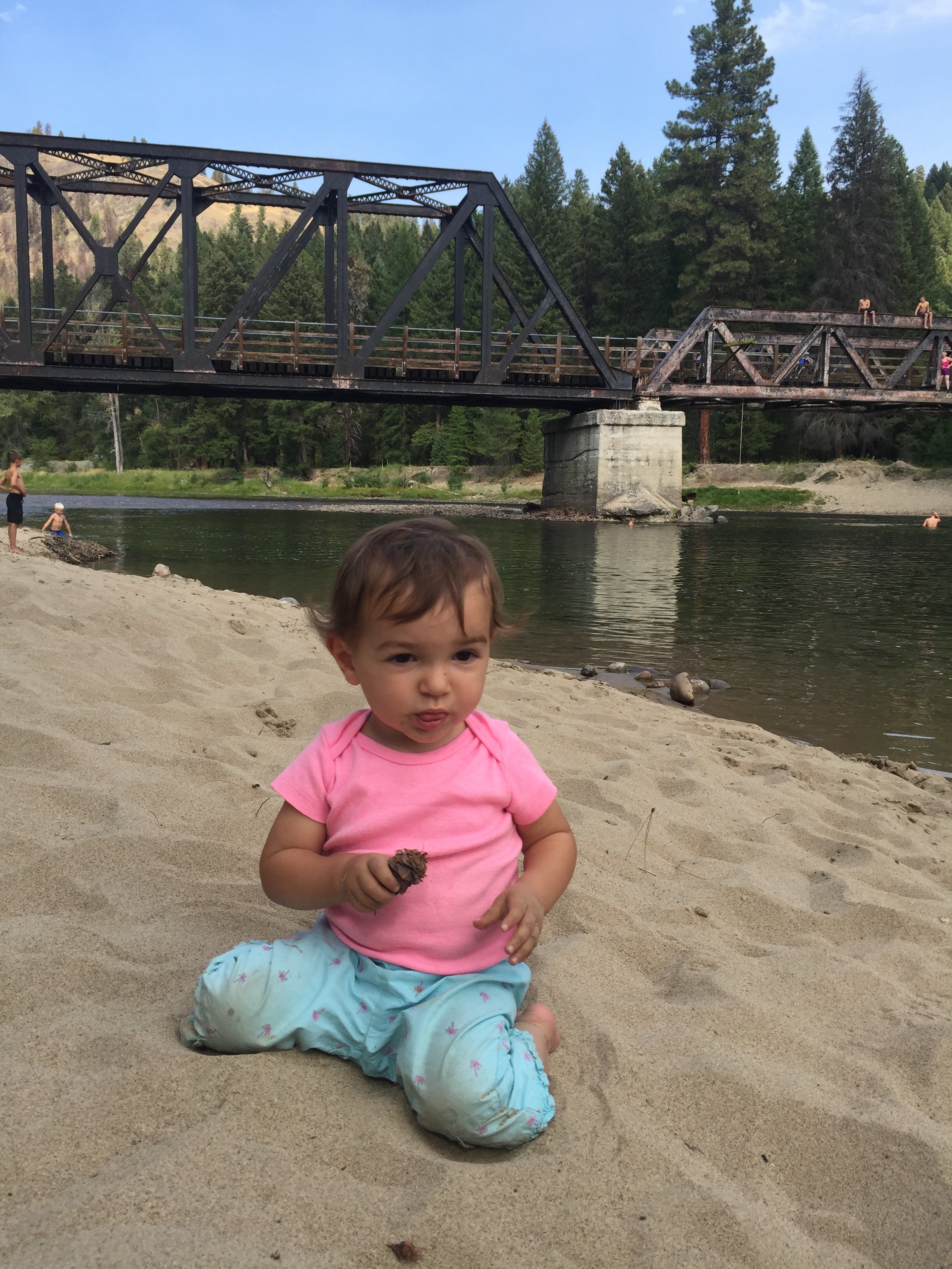 Child playing on the Kettle River BC