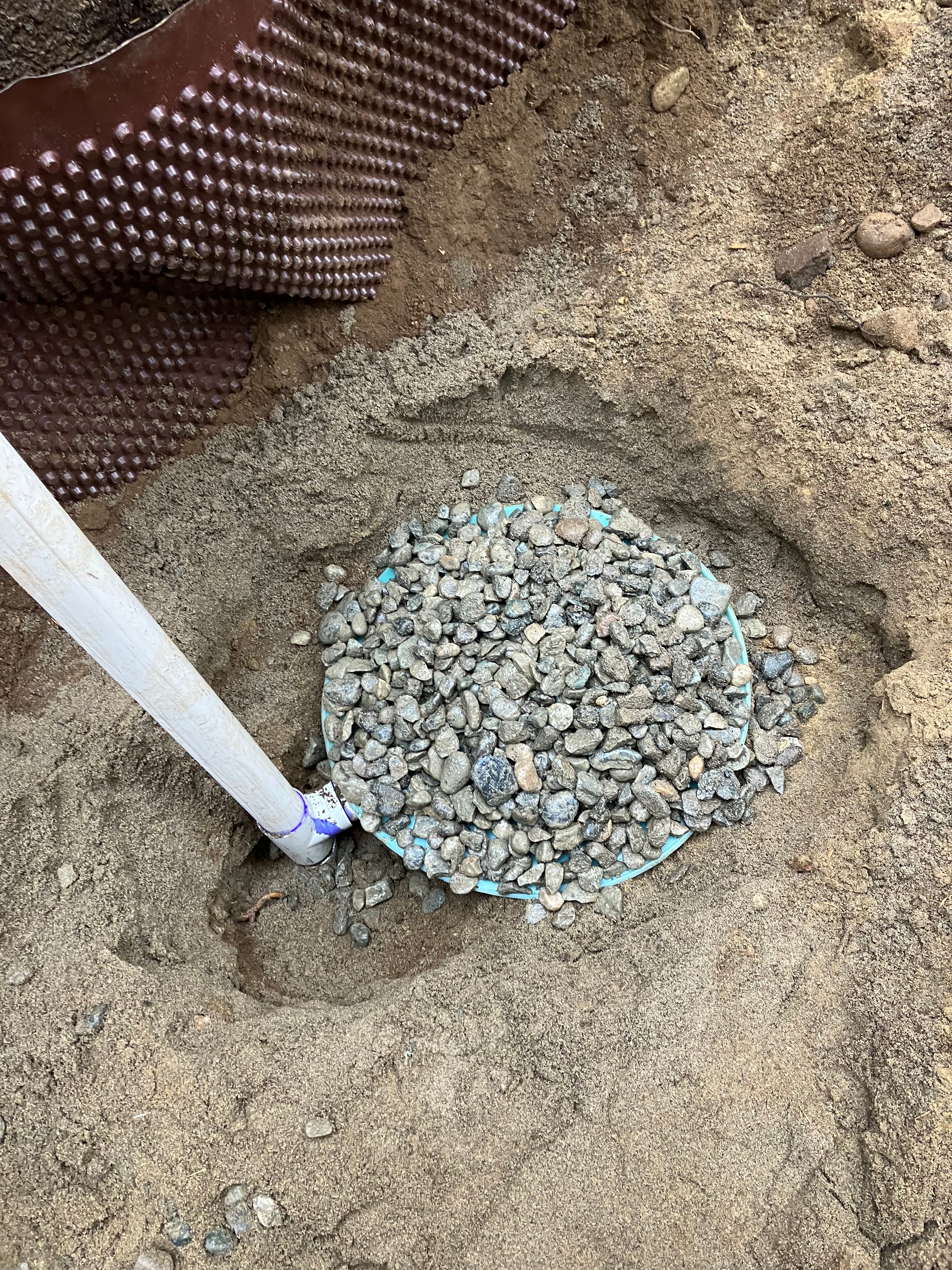 Installing a Pan Lysimeter for collecting effluent samples in a septic drainfield